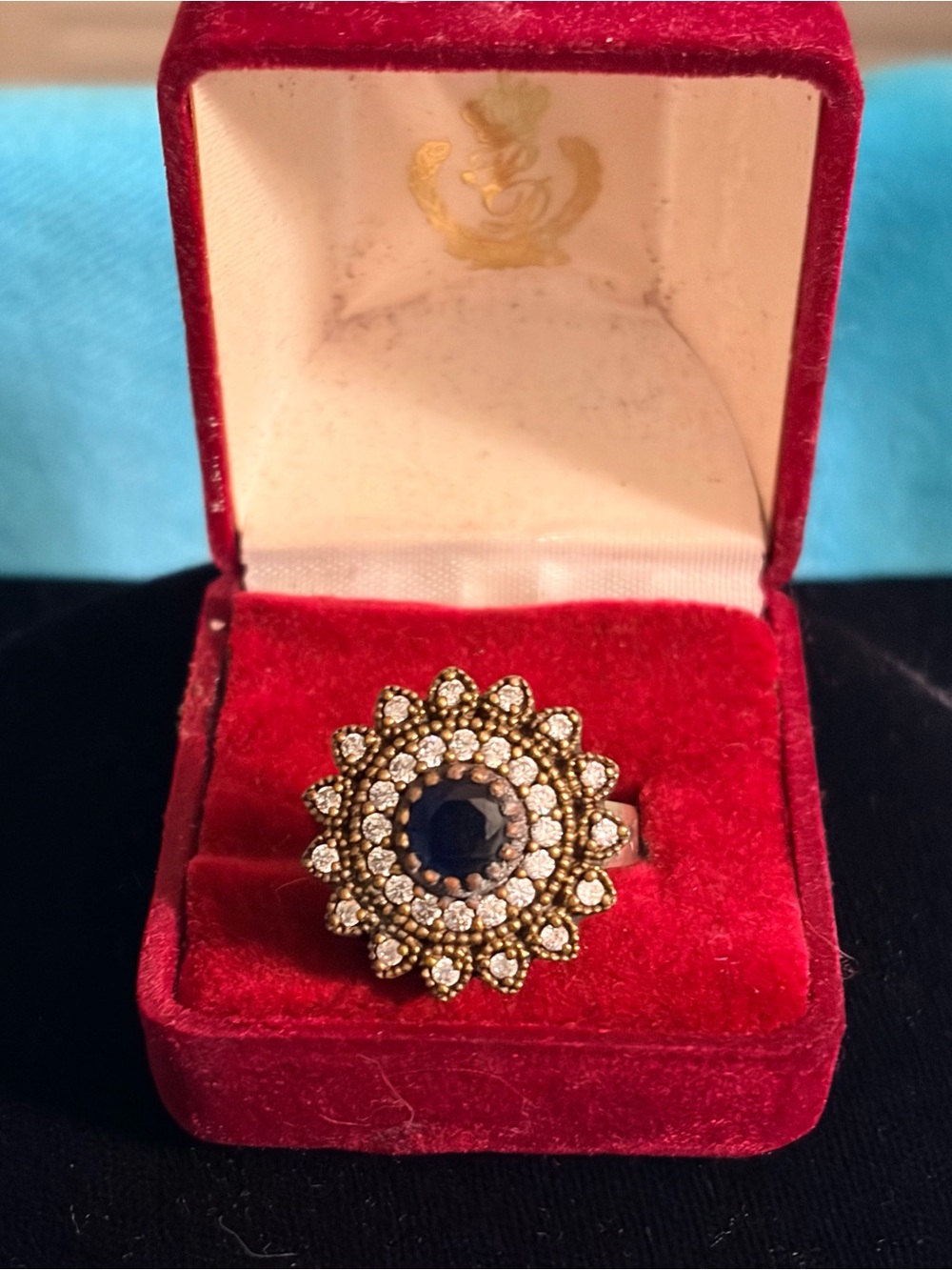 Gold-Tone Black Center Floral Halo Ring with Clear Crystal Accents
